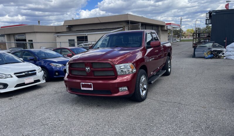 
								2012 RAM 1500 Sport 4WD 4 Dr Auto 5 Passenger V8 , 5.7L Alloy Wheels Sunroof Navigaction Bluetooth Leather Certified full									